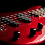 Bass guitar close-up. Photo in low key